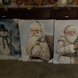 Dollar General  Viral Classic Santa and Snowman Holiday Canvas Trio.  .  3